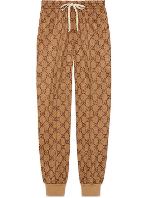 fake gucci track pants|farfetch gucci joggers.